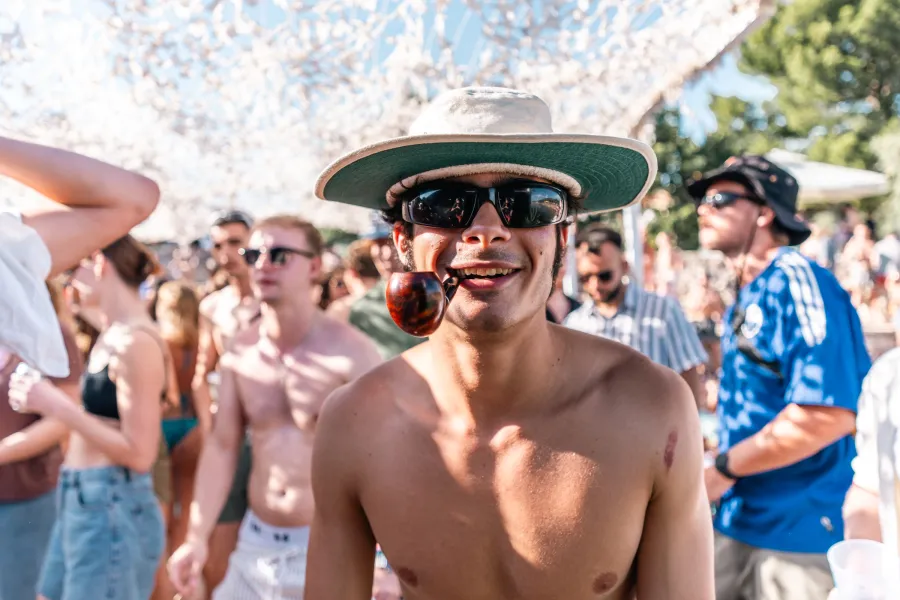 Young man partying at a festival